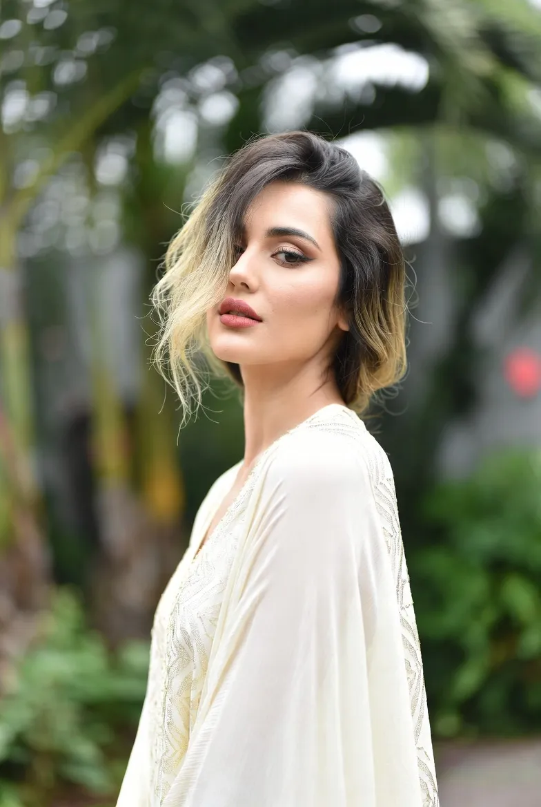 gempix2 A Halloween costume portrait holding a glowing Jack-o'-lantern. before