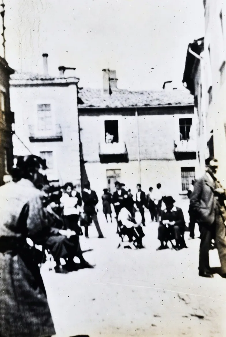 gempix2 Realistically colorize a black and white photo with natural tones. before